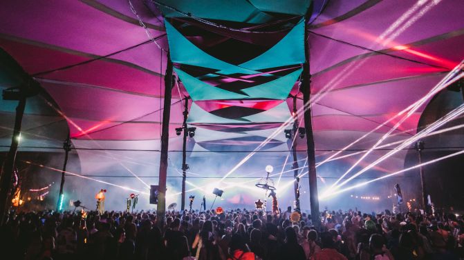 Strawberry Fields festival tent with laser and lighting production